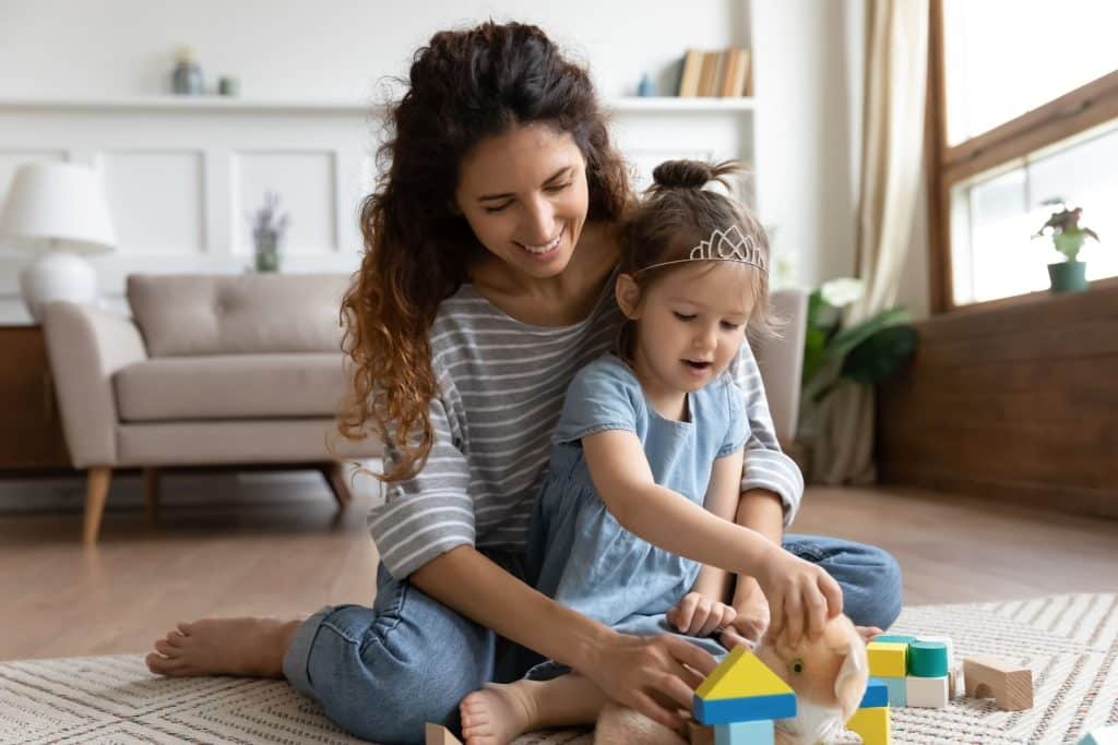 Elite Nanny League nanny working with a Houston family in a modern home