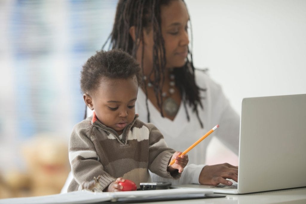Houston parents rushing between work and childcare with multiple kids