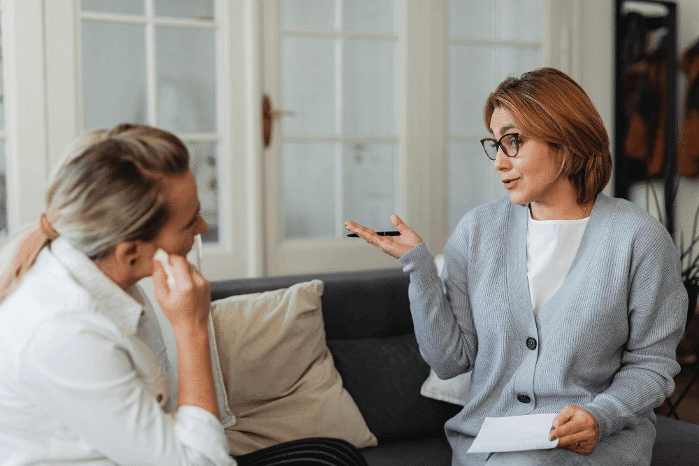 Houston parents in a consultation with an Elite Nanny League representative discussing overnight nanny options.