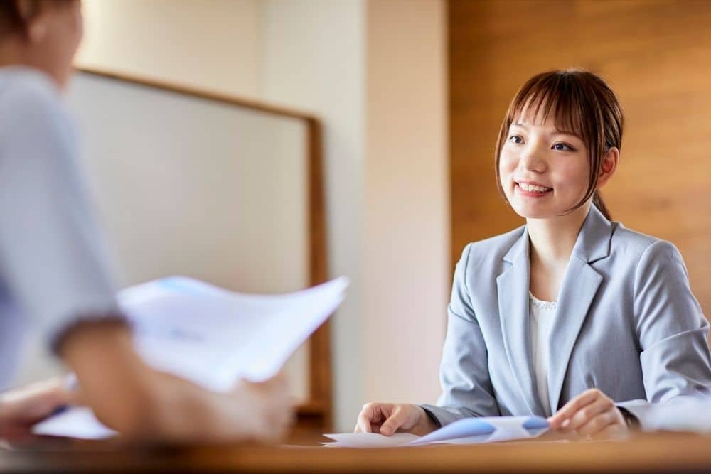 Professional recruiter conducting background checks and reviewing nanny references for Houston families.