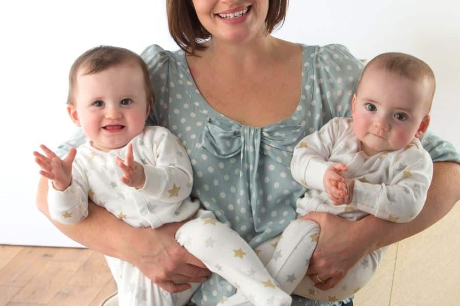 Newborn care specialist in Houston supporting parents of twins before transitioning to a nanny