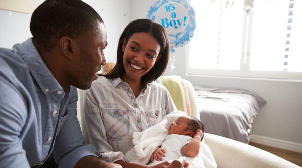 Expecting parents deciding between newborn care specialist and night nanny 