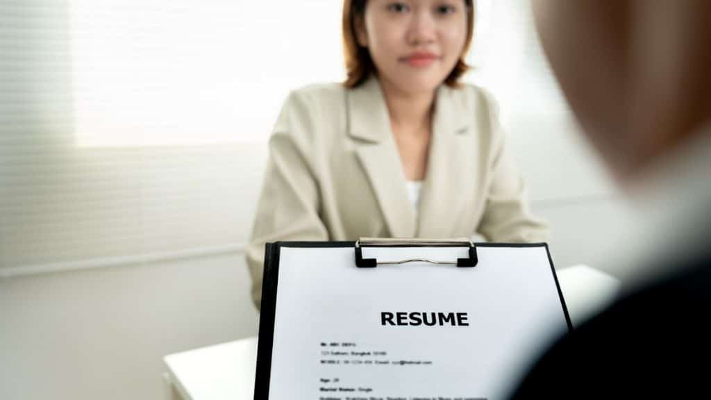 Identity verification process showing address history and document review for nanny screening