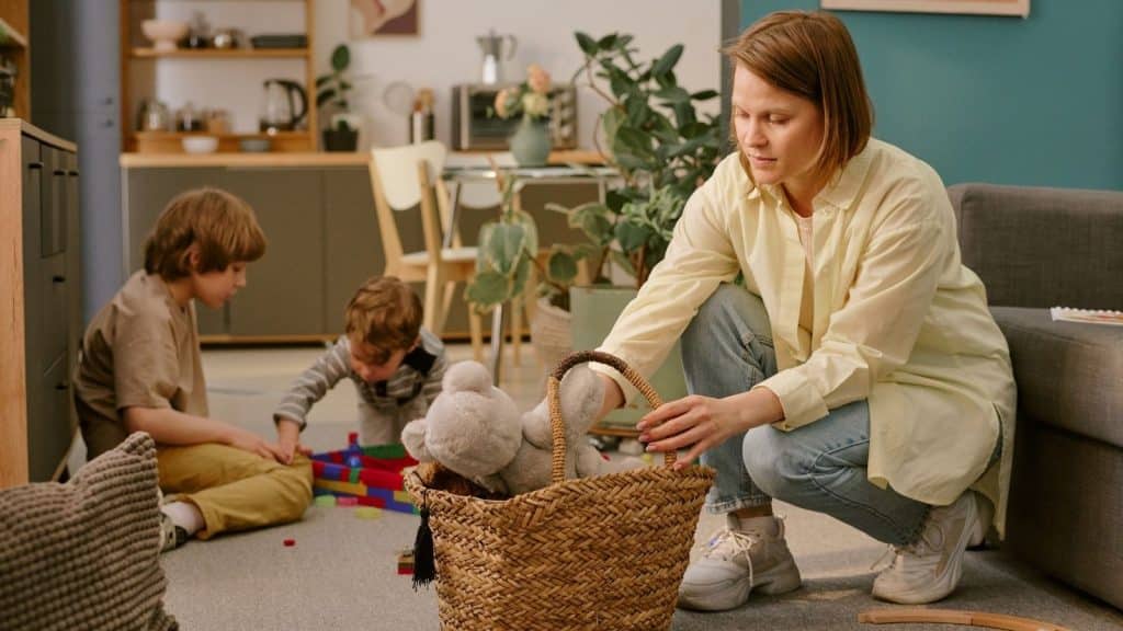 Professional nanny respectfully interacting with children while following household rules