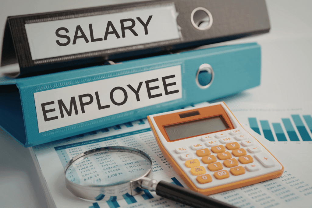 Household employer tax documents and nanny payroll paperwork on desk