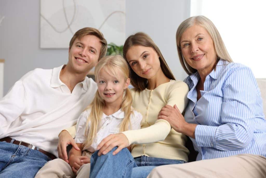 Happy family with trusted long-term nanny relationship