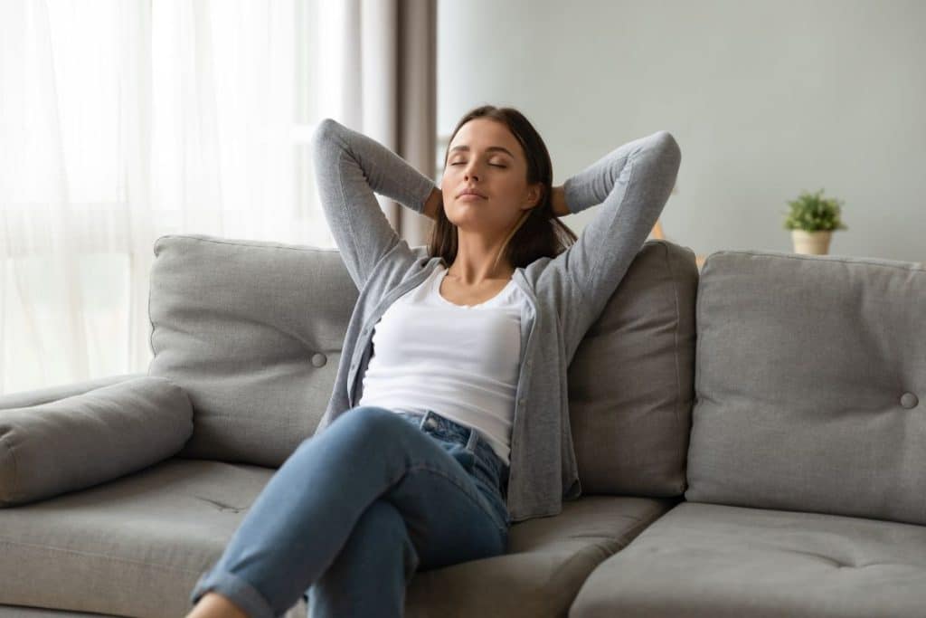 Nanny relaxing in private space after work hours, representing healthy work-life boundaries