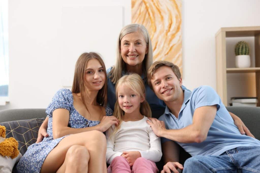 Happy family with nanny building trust and long-term relationship