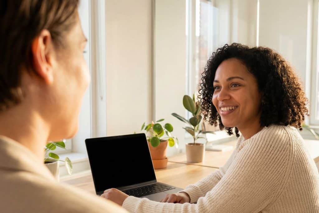 Parent interviewing nanny candidate in a professional setting