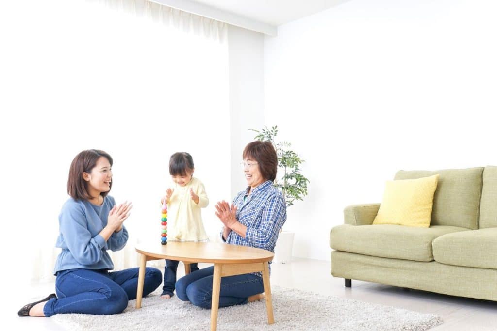 “Professional nanny building rapport with a child during an interview trial”