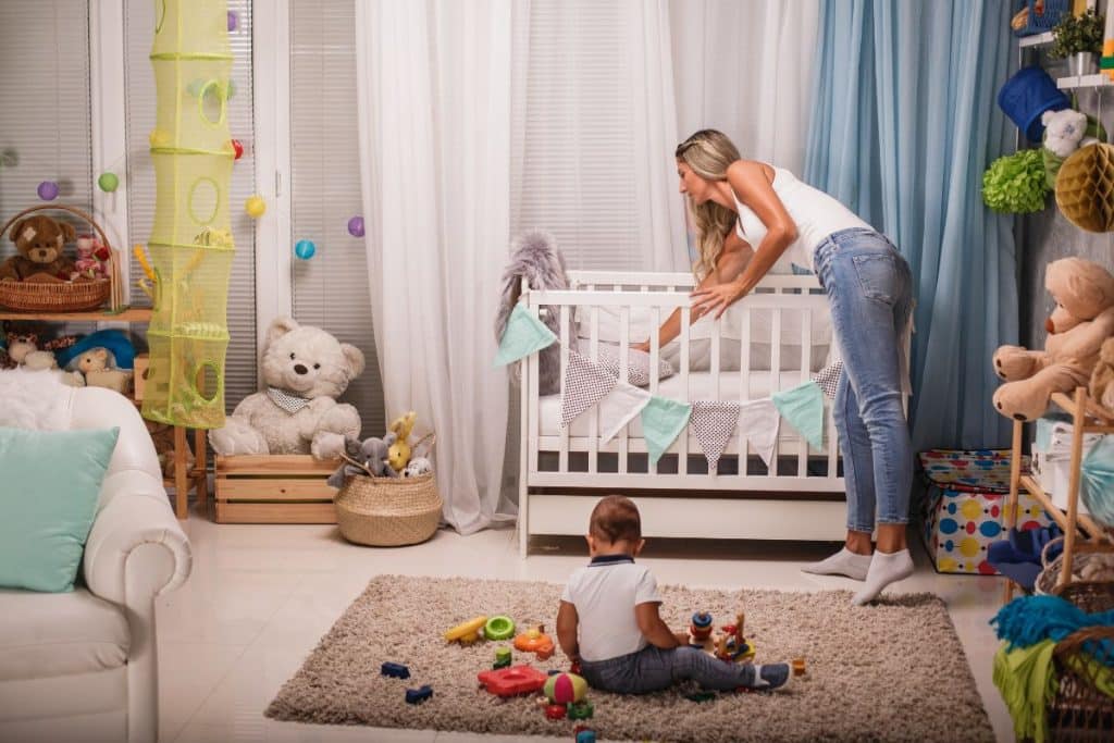 Organized nanny preparing educational activities and daily routines for children