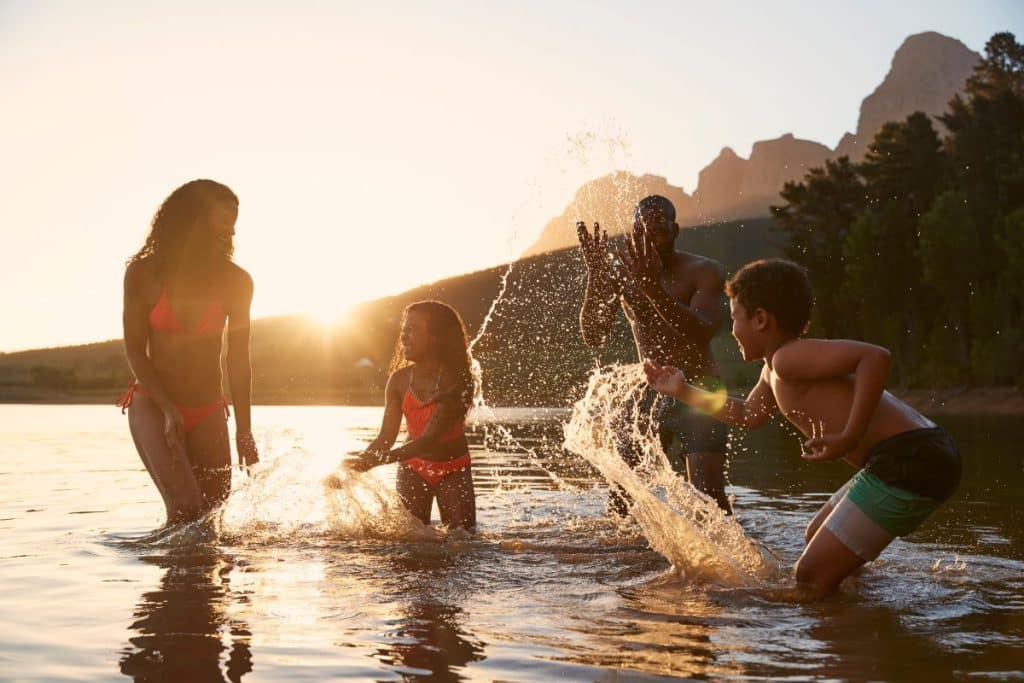 Family and travel nanny enjoying a successful and stress-free vacation together.