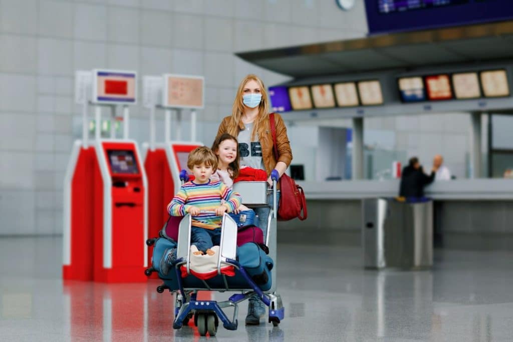 Experienced travel nanny helping children navigate airport travel and family trips.