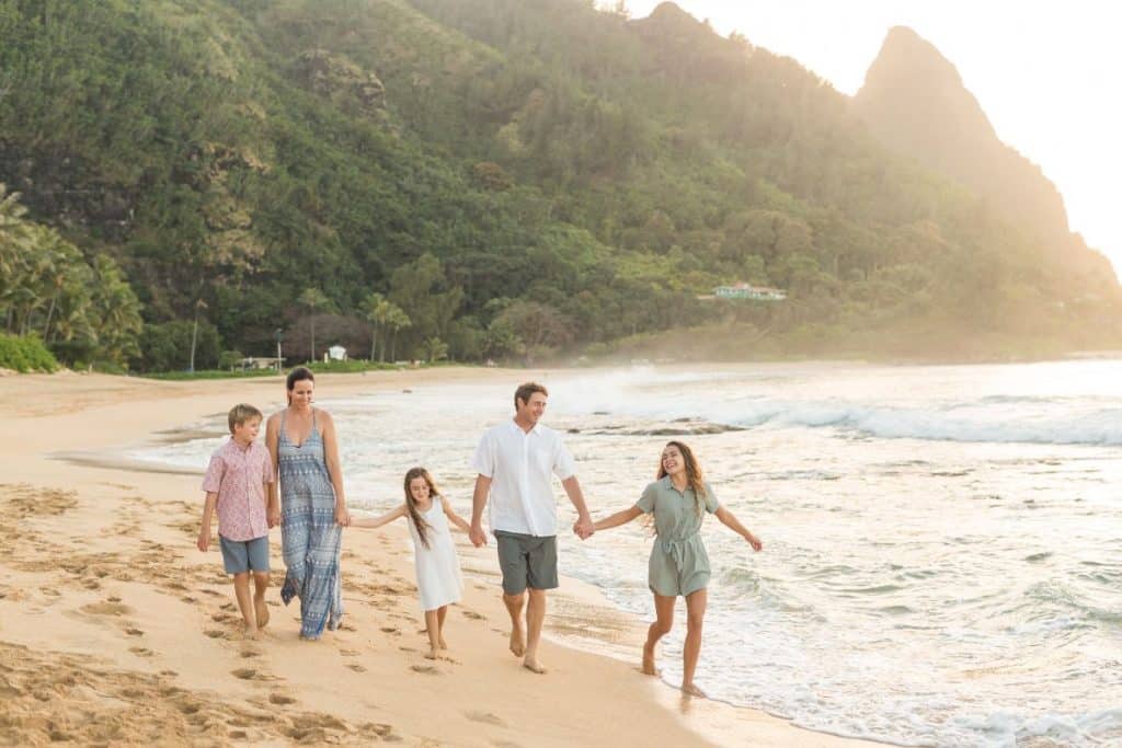 Family enjoying a successful vacation with professional childcare sup