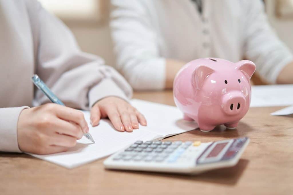 Houston parents calculating nanny costs and childcare expenses for their family budget.