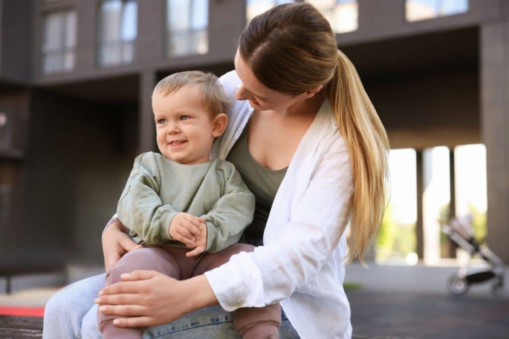 Travel nanny providing evening childcare while parents enjoy vacation activities.