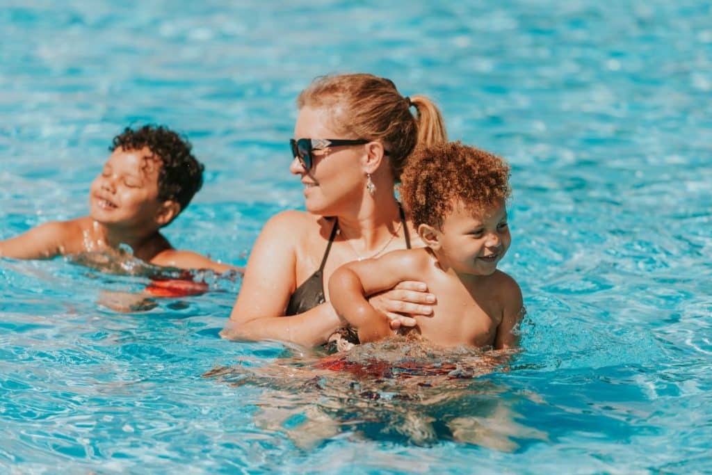Vacation babysitter providing temporary childcare during a family vacation.