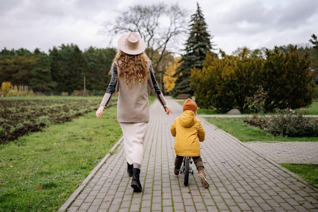 Professional nanny caring for children in a Houston neighborhood