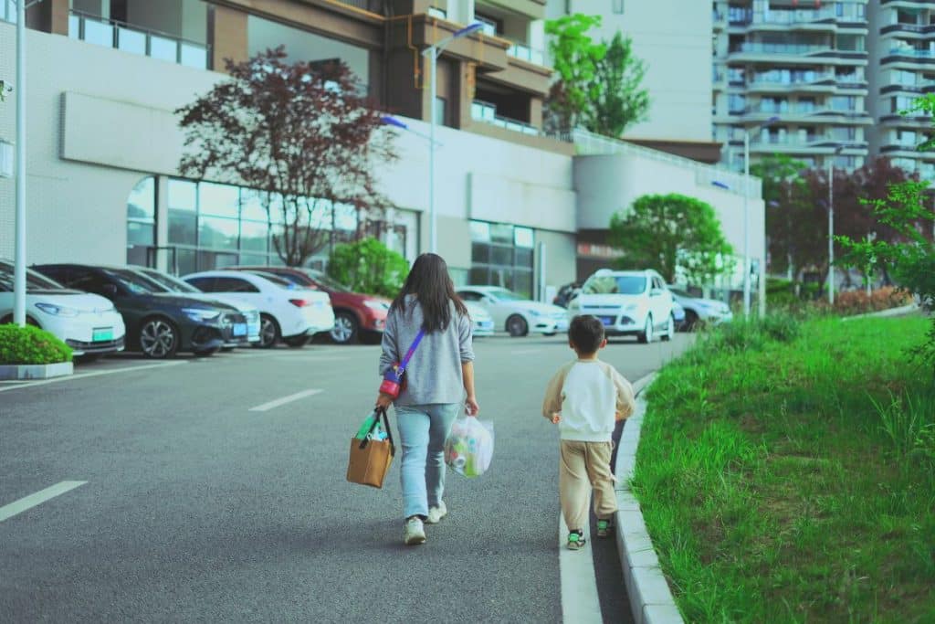 Family, child, and professional nanny enjoying a successful back-to-school routine together.