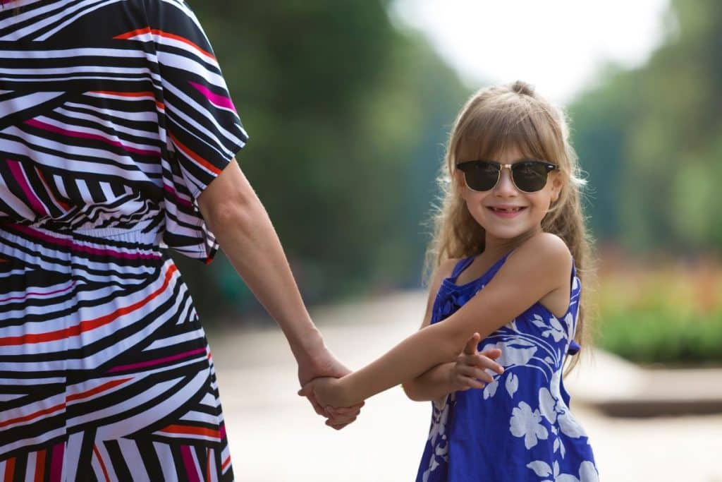 Happy child and trusted nanny sharing a positive moment that reflects emotional growth and confidence.
